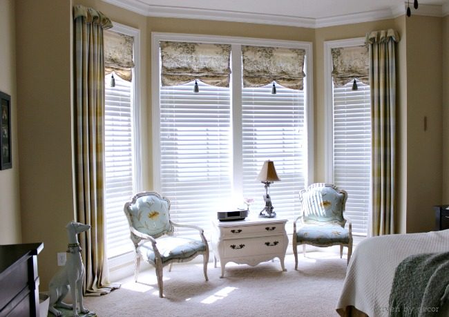 Unique window treatments in master bedroom