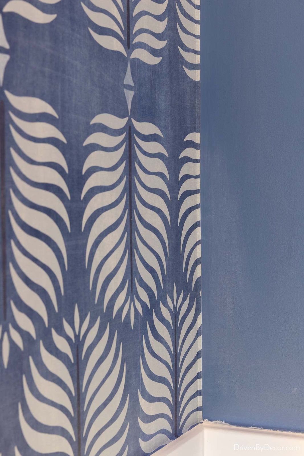Installation of wallpaper around a corner