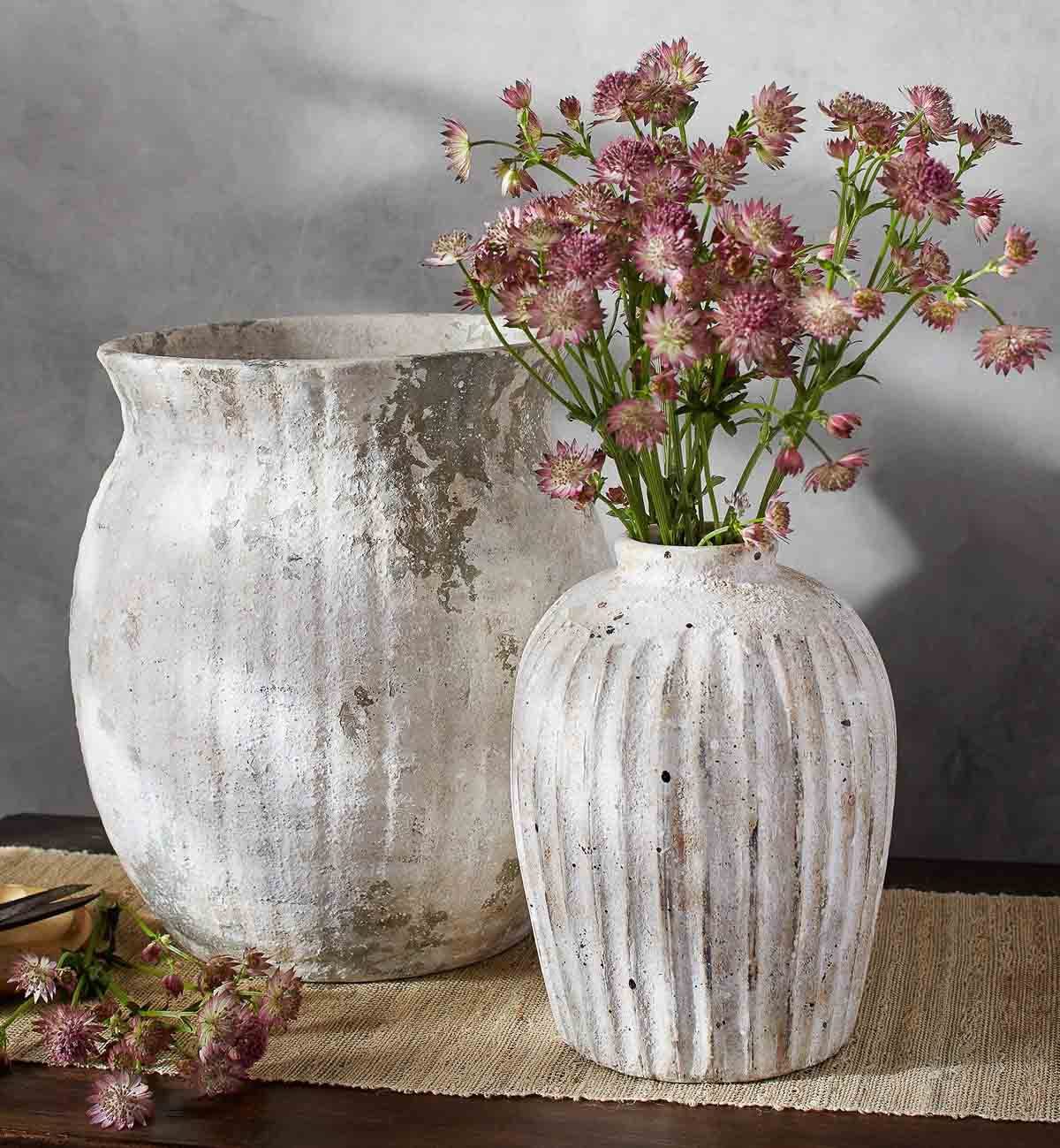 Weathered white terracotta vase