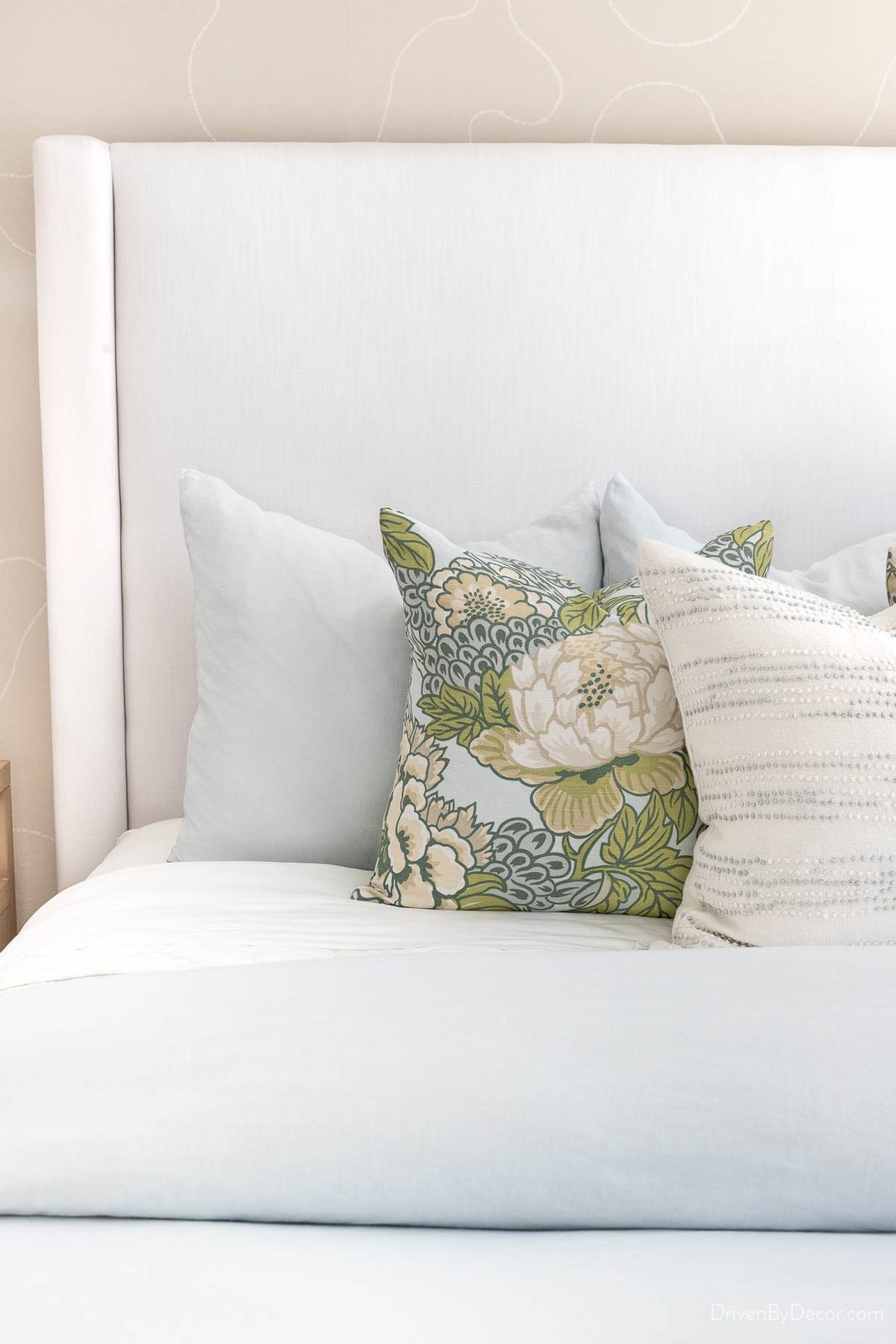 Upholstered white bed using performance fabric