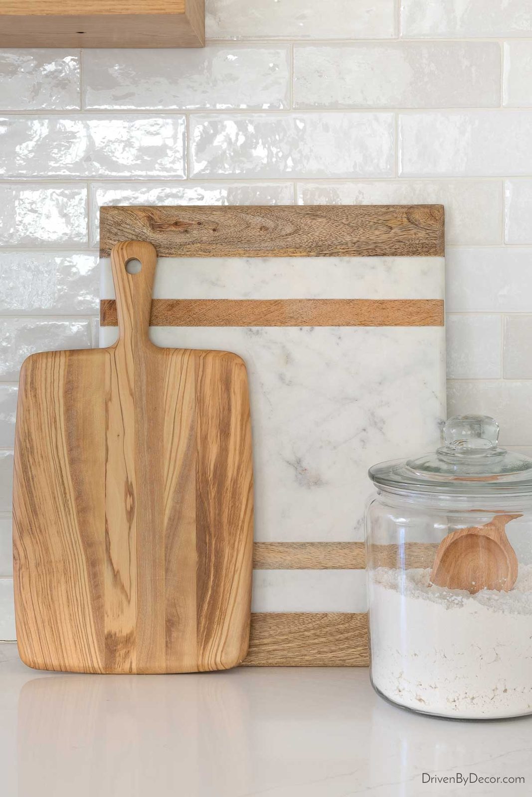Layered cutting boards on kitchen countertop