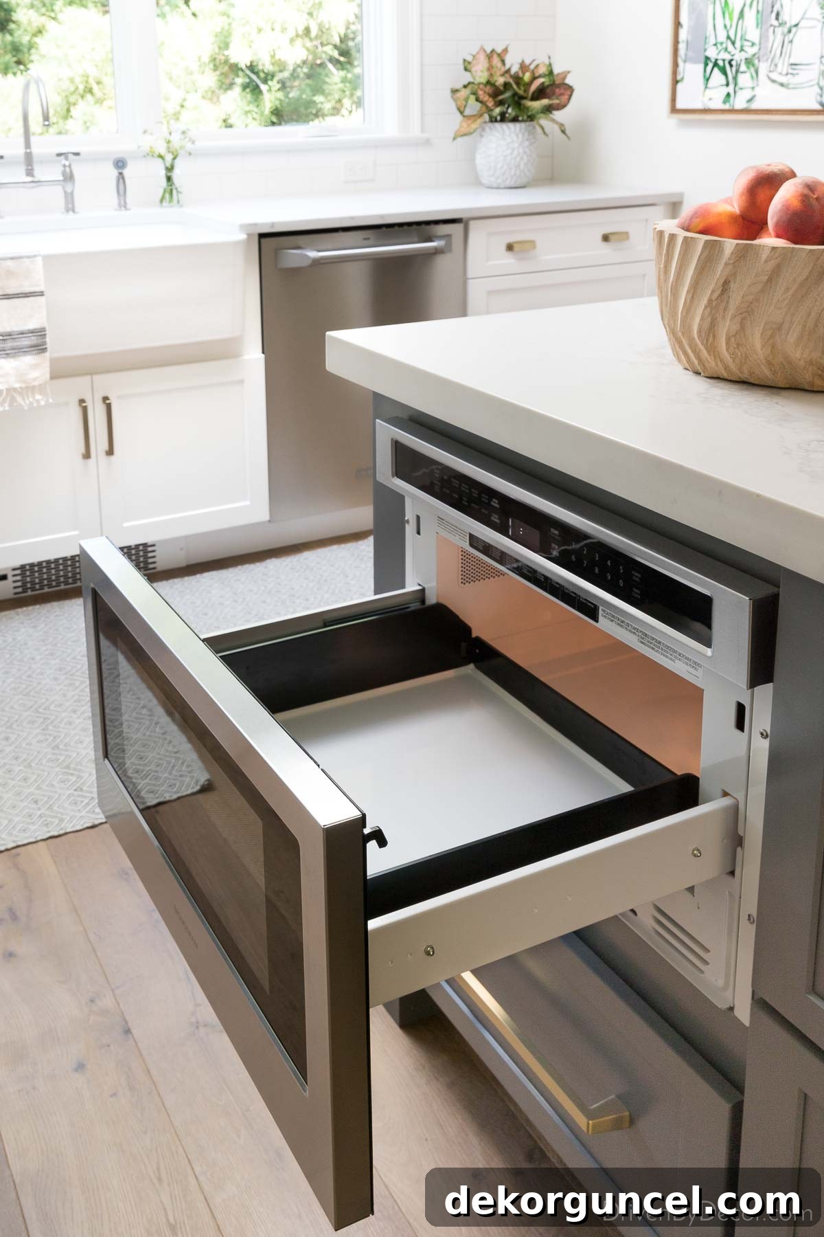 Microwave drawer in kitchen island offering sleek, accessible design