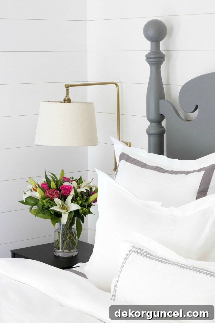 Stylish bedroom featuring Boll & Branch sheets and bedding, highlighting comfort and quality sleep essentials.