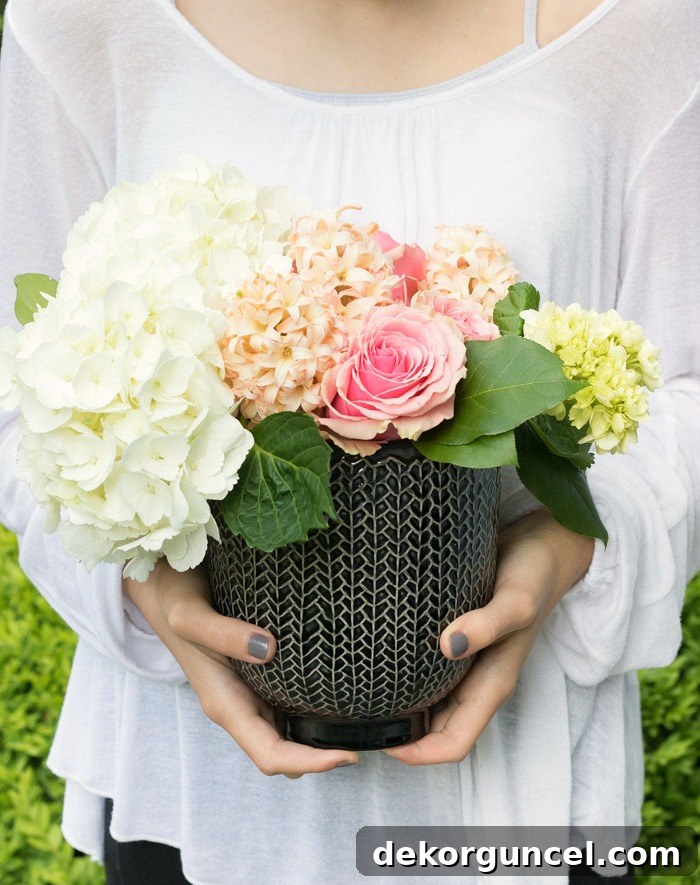 Simple Hostess Gifts That Impress 11 A small bouquet of flowers thoughtfully presented in a beautiful reusable pot is the perfect hostess gift, offering lasting beauty.