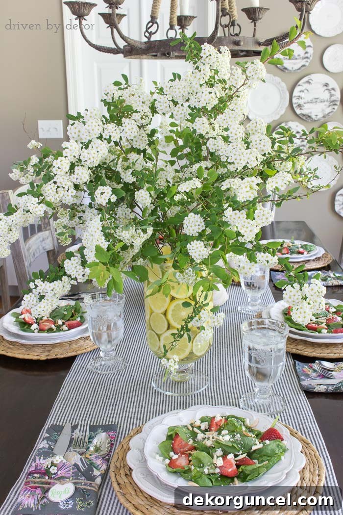Create a simple centerpiece with flowering branches and a lemon filled vase - this post has a great tip for the easy way to do it!