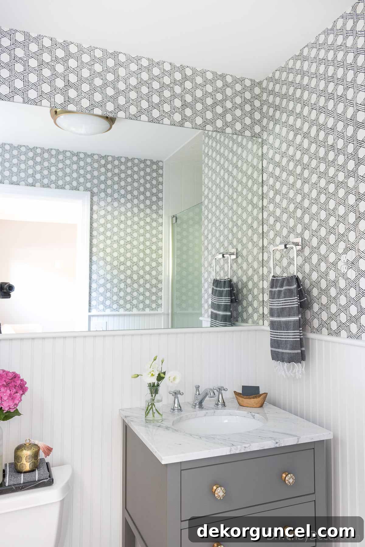 The black and white wallpaper we used to dress up our guest bathroom