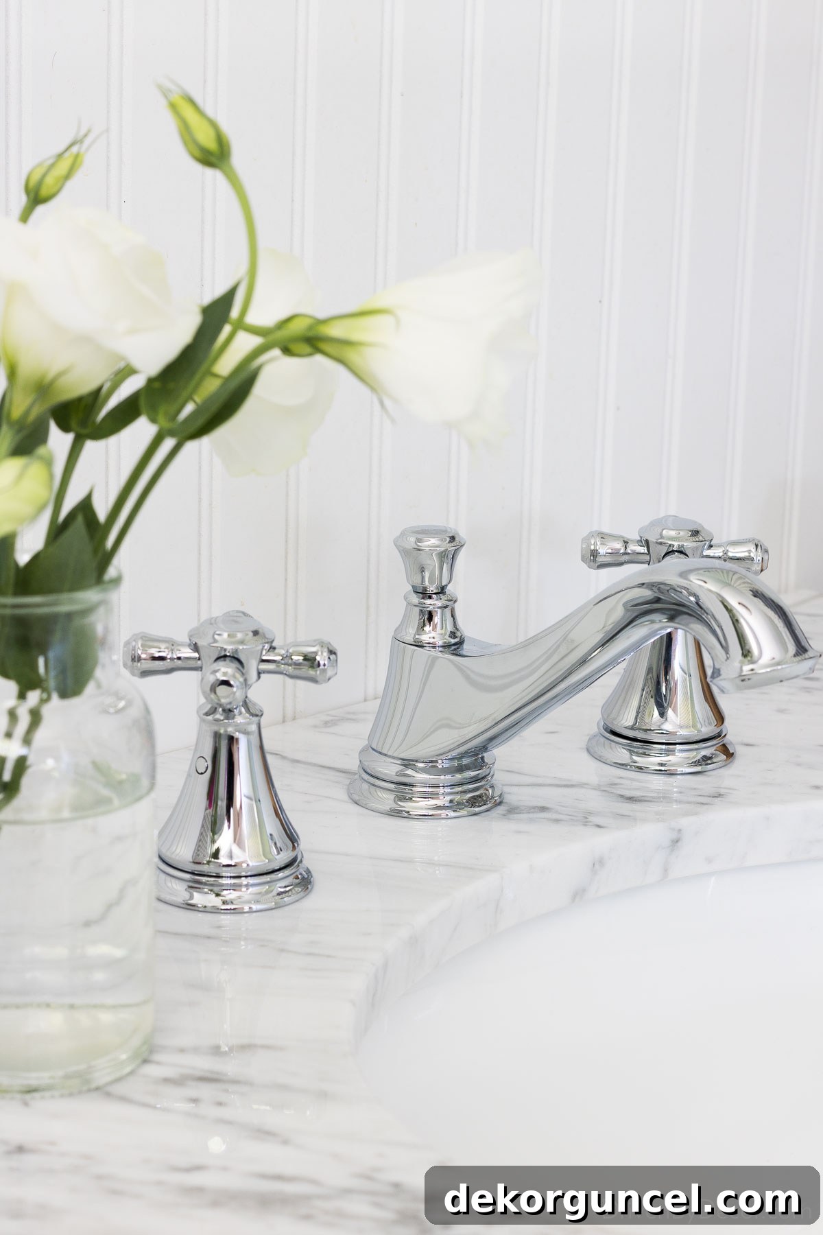 A small vase of flowers added to our guest bathroom