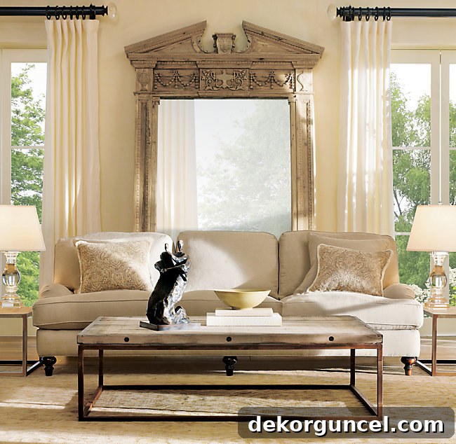 A grand oversized wood leaning mirror creates a dramatic focal point and enhances depth when placed behind a sofa.