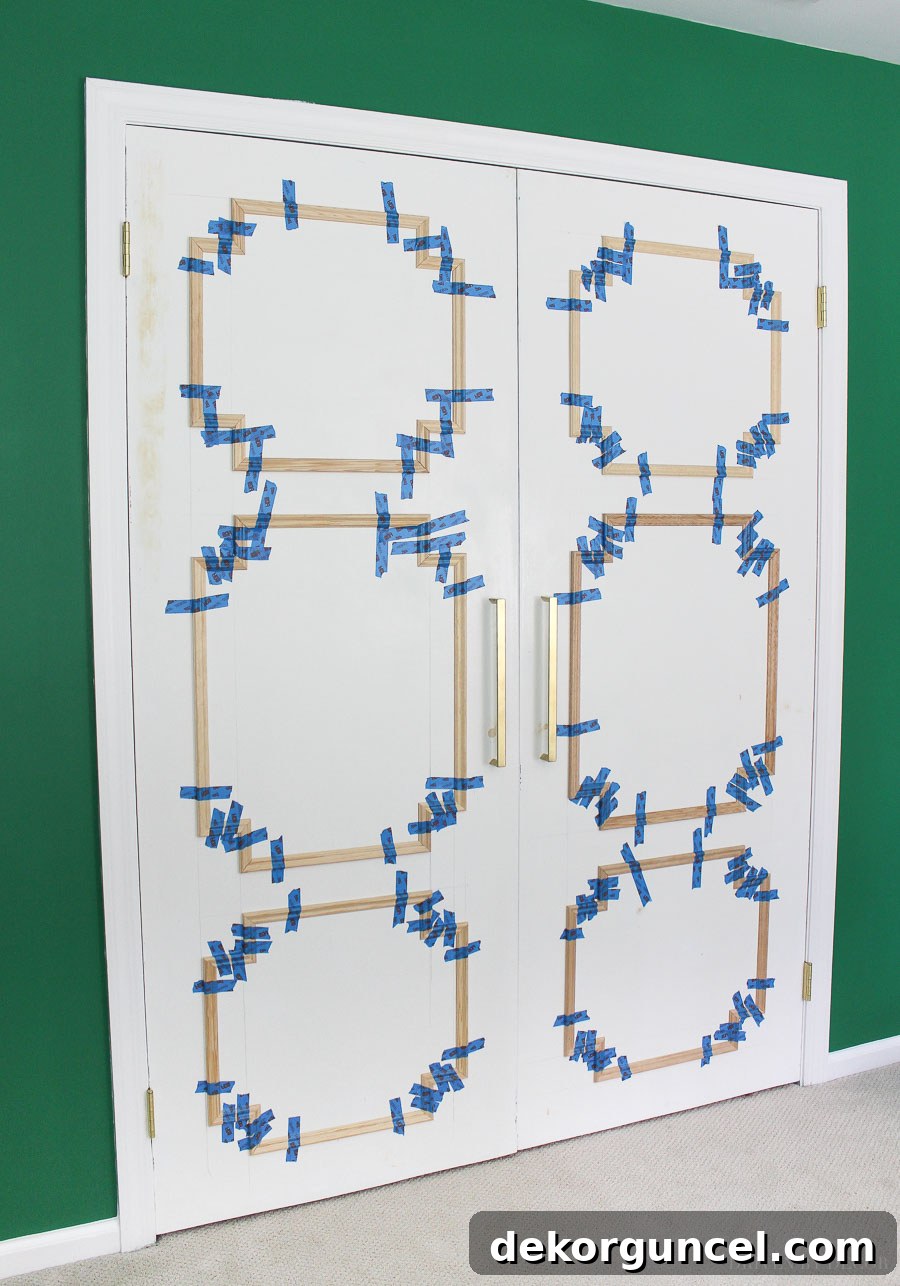 DIY Flat Panel Door Upgrade Guide 7 Such a great closet makeover done by adding moulding to a flat door!