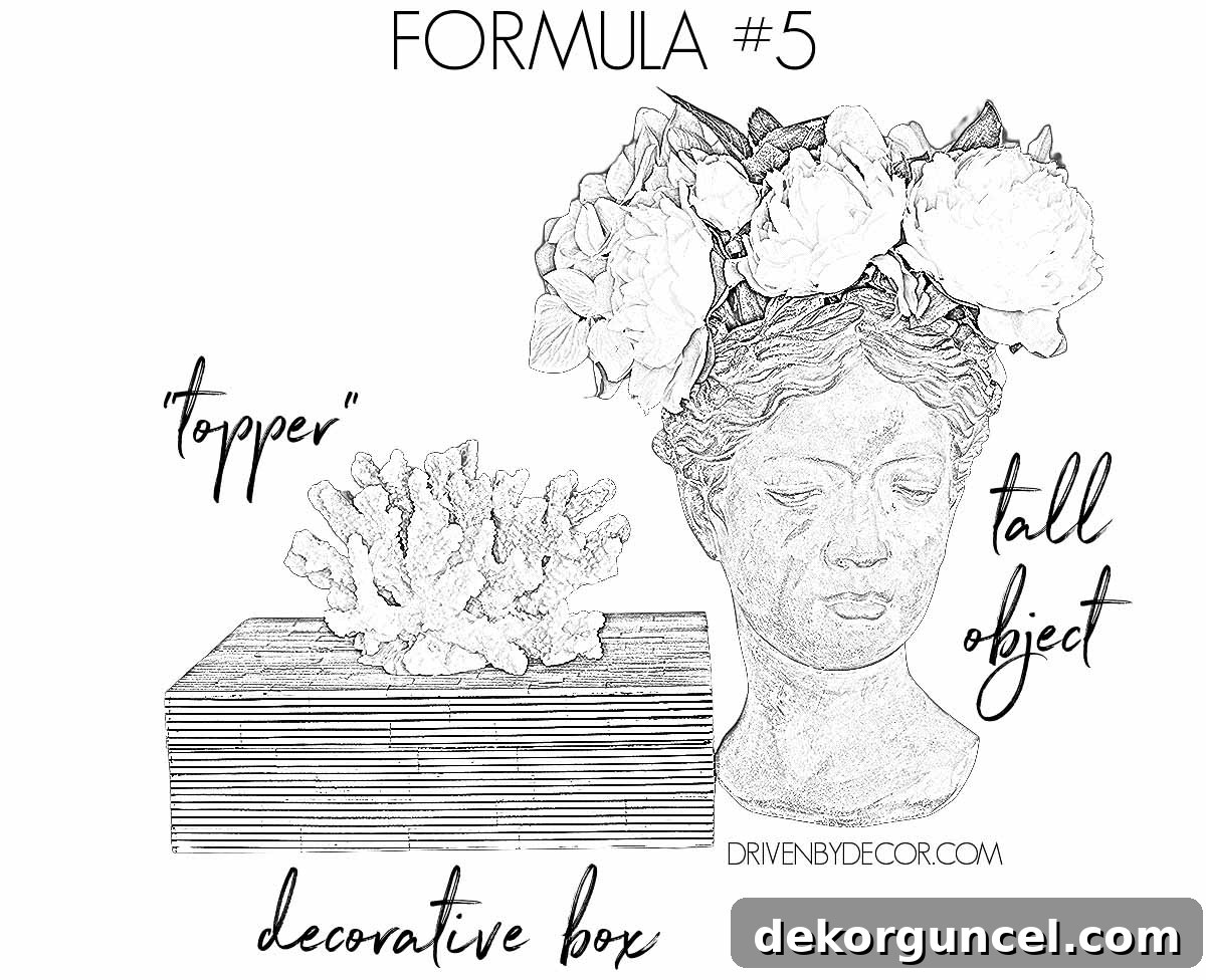 Versatile formula for how to decorate a bookshelf: combine a decorative box with a topper and a striking tall object.