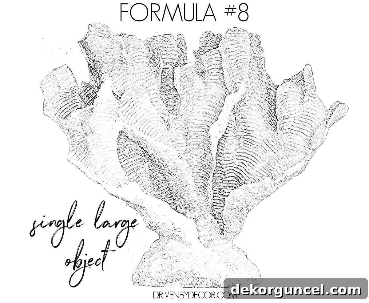 Impactful formula for how to decorate a bookshelf: feature a single large, statement-making object.