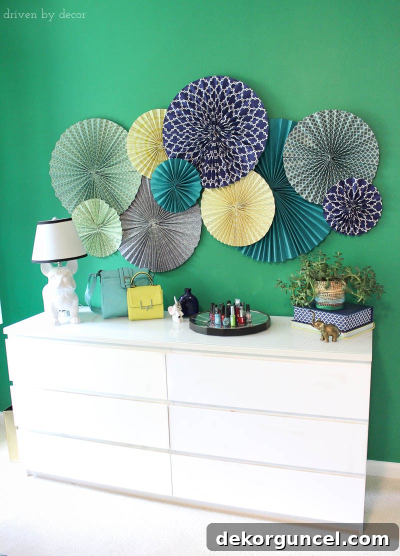 My Six Handpicked Kids Room Ideas 3 Create simple, inexpensive, and charming wall art for a kid's room using paper rosettes. A delightful DIY decor project!