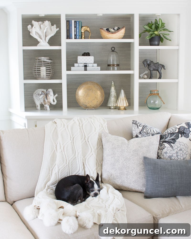 Wrapped presents used to decorate bookshelves for Christmas! Love this idea and the others in this post about stress free holiday decorating!