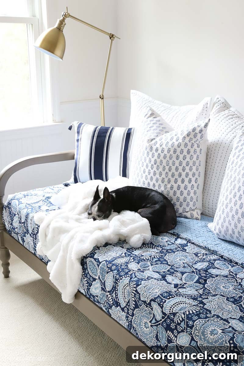 More great tips on how to start decorating your bedroom. Showcasing the harmonious blend of colorful Vera Bradley bedding with a warm wood daybed and an elegant brass floor lamp.