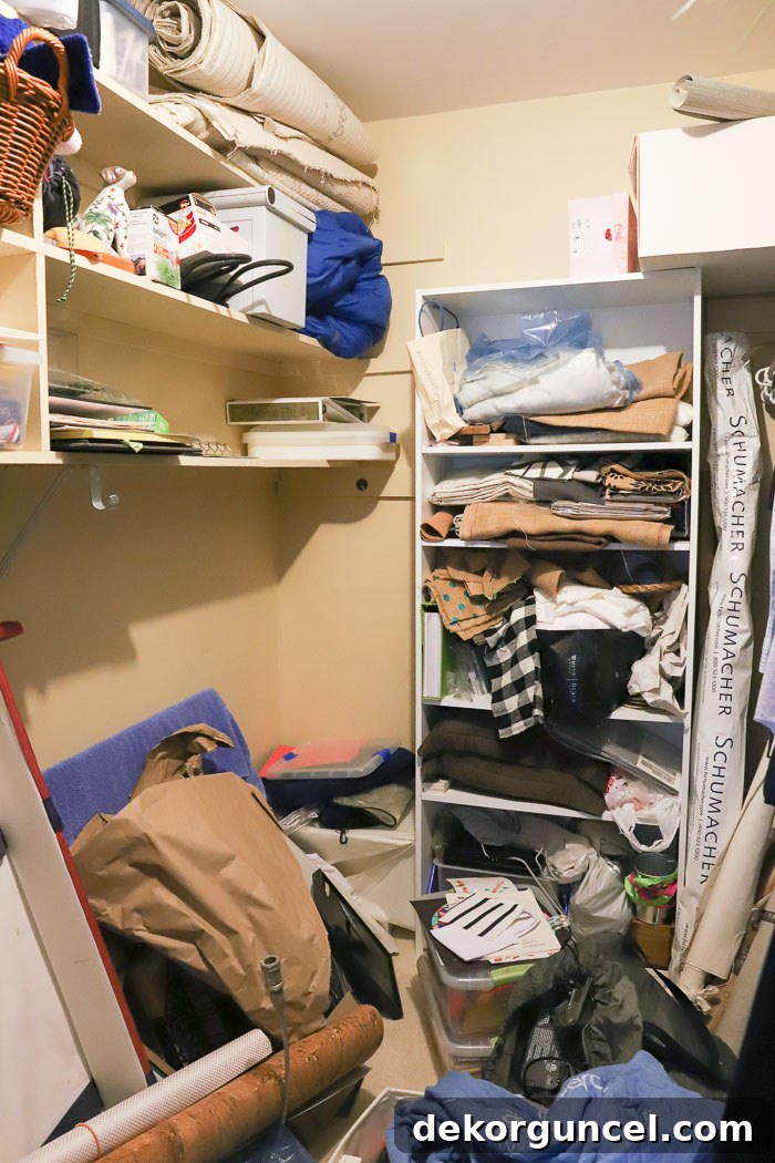 Our mess of a storage closet before its makeover