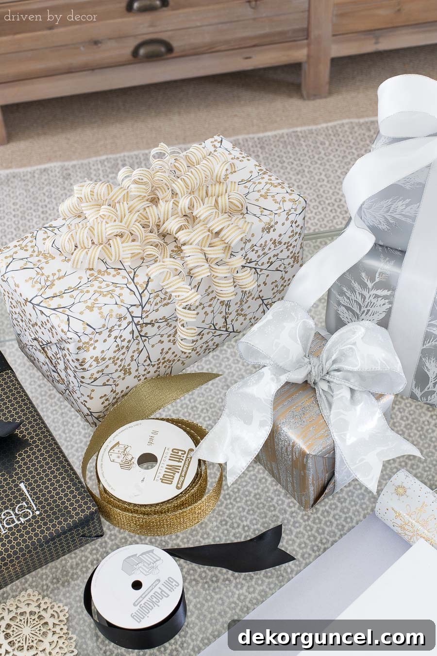 Simple yet stunning: add a pre-made curly bow or festive embellishment to Christmas presents for an instant upgrade.