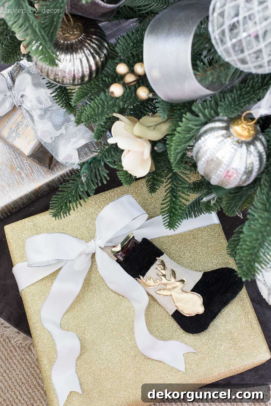 Add a mini stocking with a sweet treat to your Christmas presents for a delightful and festive surprise, perfect for kids.