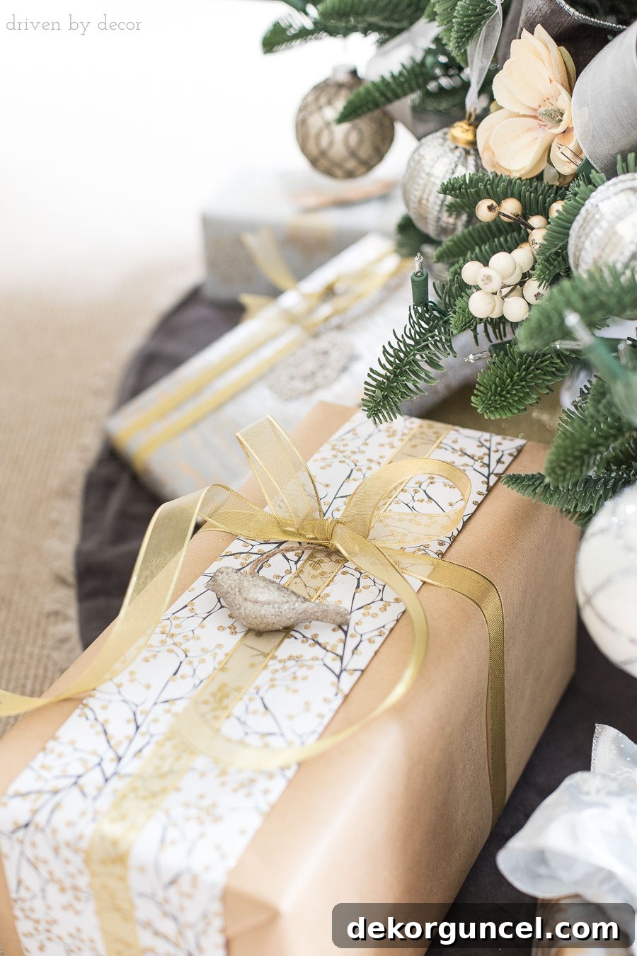 Transform a plain kraft paper Christmas gift by adding a folded strip of decorative wrapping paper scrap, tied with a bow.