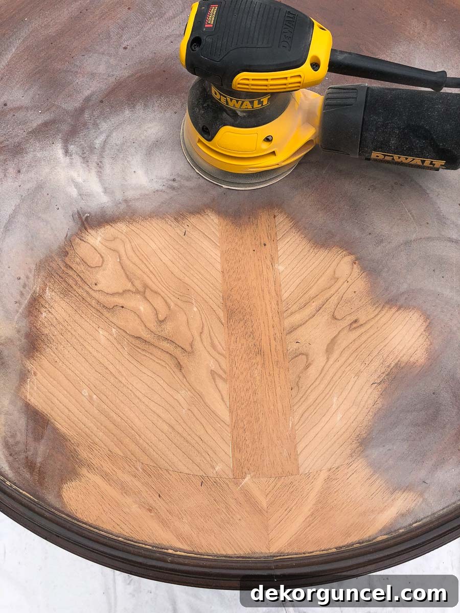 How to Refinish an End Table From Beat Up to Beautiful 4 Stunning wood grain design revealed after sanding off dark stain during furniture restoration