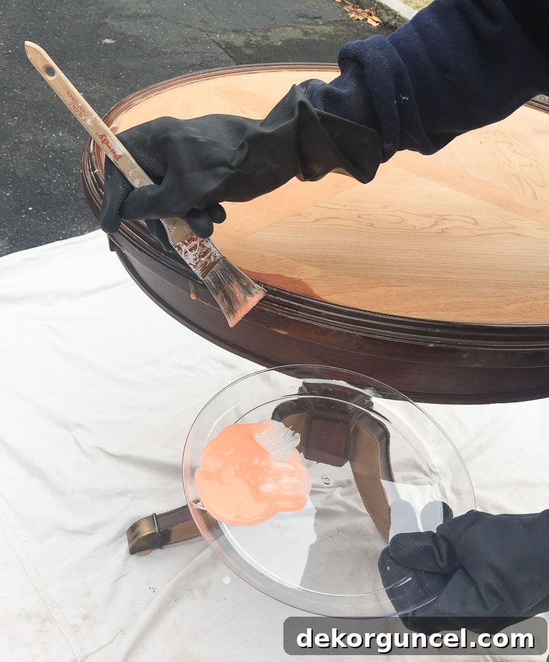 How to Refinish an End Table From Beat Up to Beautiful 5 Using gel wood stripper to easily remove old varnish from furniture