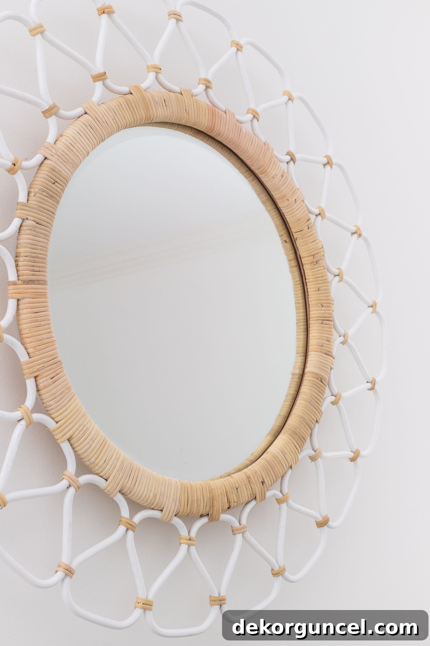 Love this rattan mirror that she put above the bed!