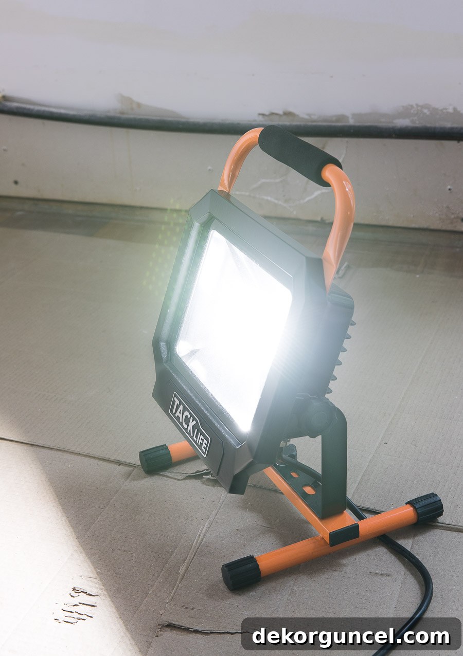 7 Speed Painting Secrets for a Flawless Finish 4 I need one of these LED work lights! So helpful when painting walls!