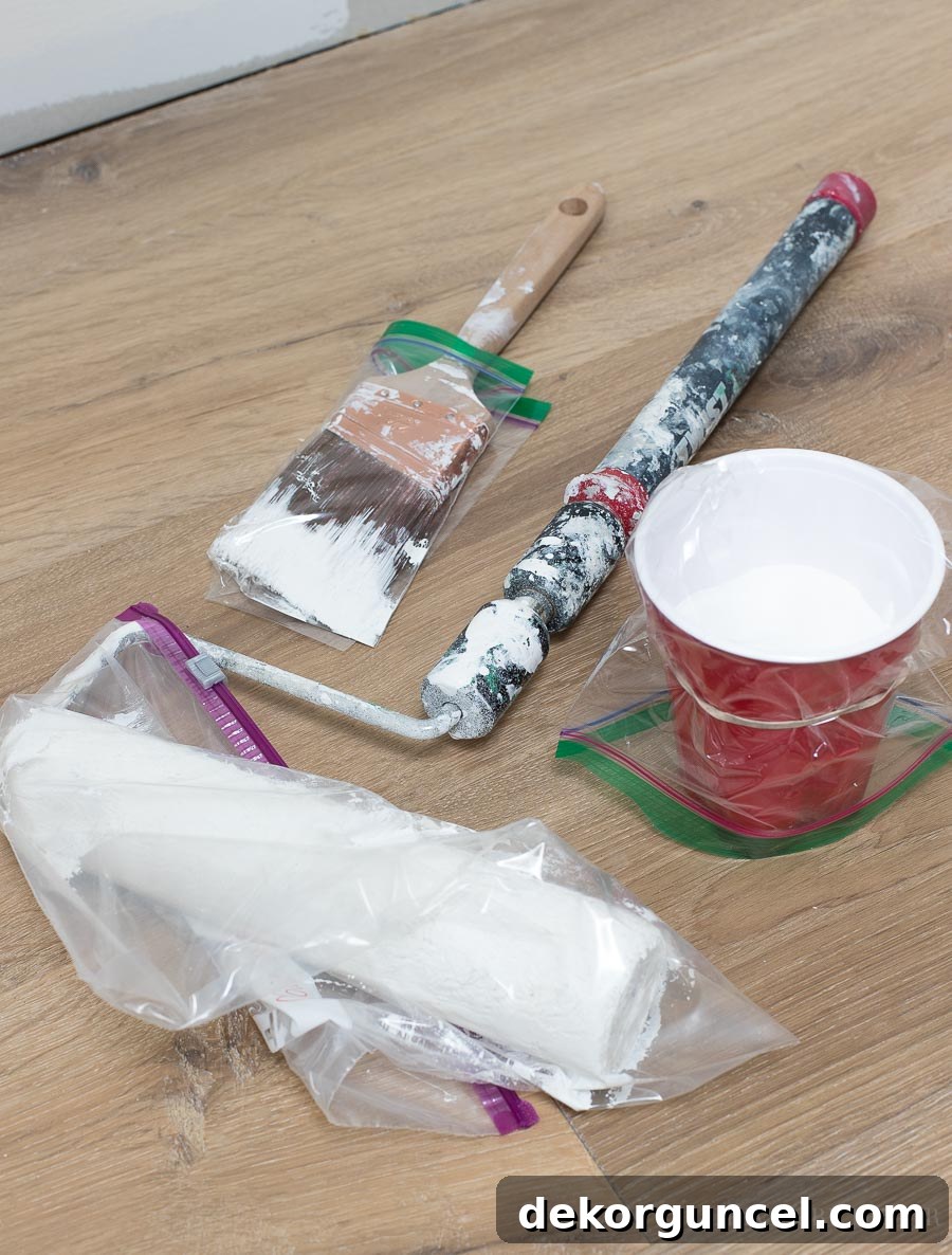 7 Speed Painting Secrets for a Flawless Finish 8 So smart for storing your paint roller and brushes for the next day! Loving this tip and all of the other time-saving painting tips in this post!