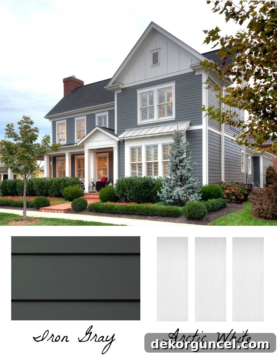 Outdoor Home Design and Color Ideas 6 Experience the striking beauty of a dark gray and white exterior: James Hardie's Iron Gray HardiePlank contrasted with Arctic White HardieTrim Batten Boards and Vertical Siding, creating a modern and sophisticated curb appeal.