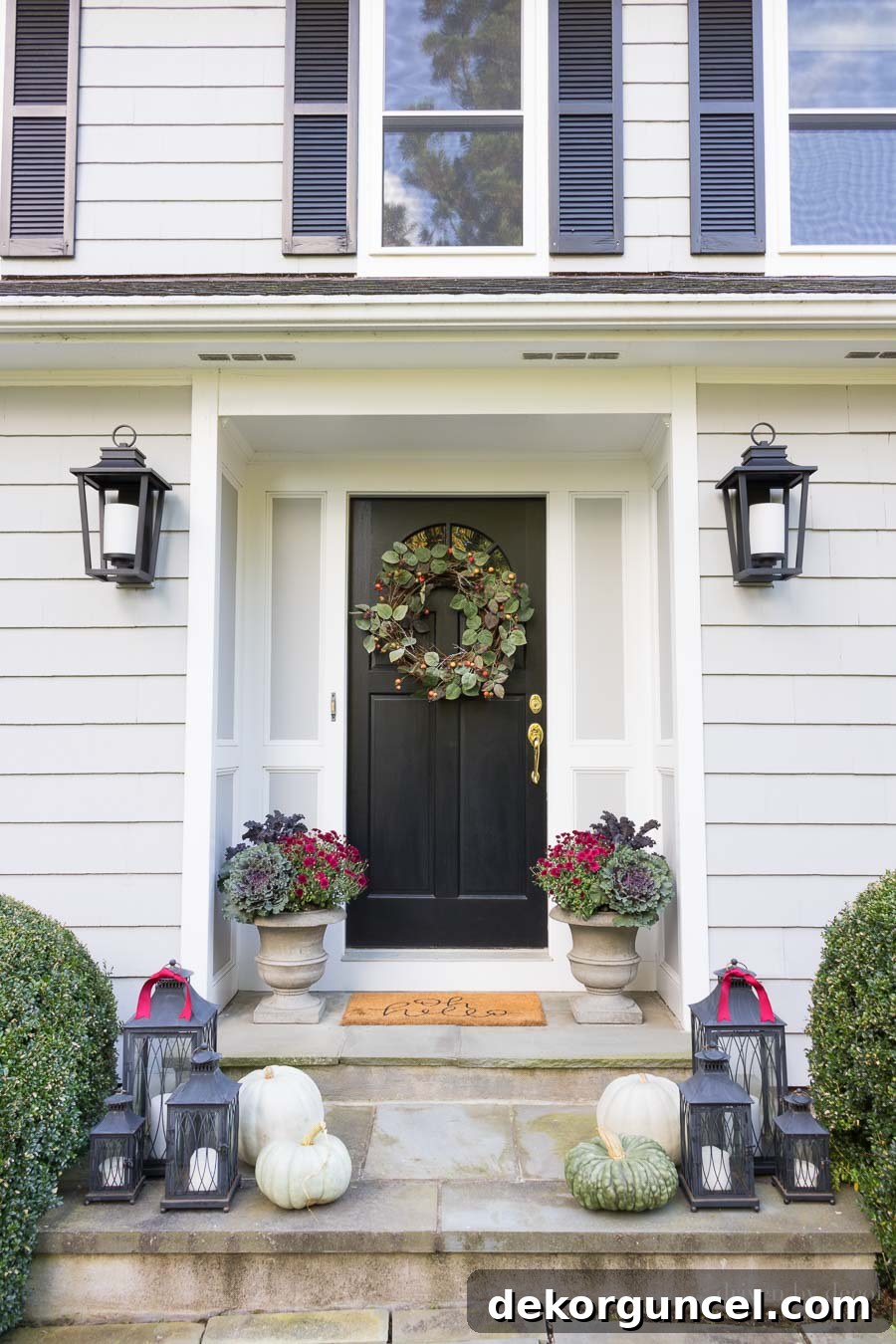 Before image of a dirty stone front porch, illustrating the need for pressure washing.