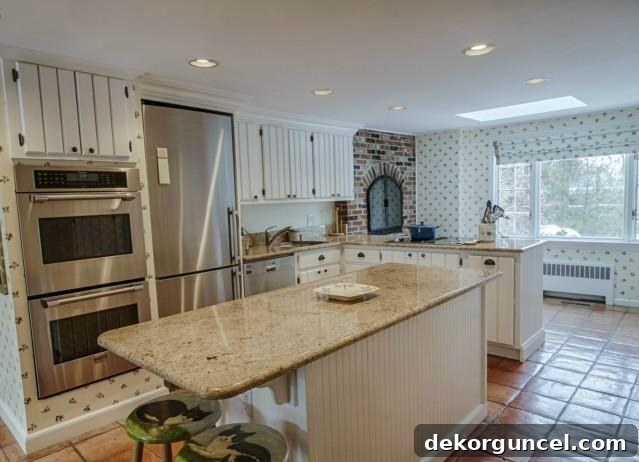 Our Kitchen Remodel: From Drab to Dreamy 2 A glimpse into our kitchen's past, showcasing its original state when we first bought the house. A dramatic before photo of a kitchen needing a full renovation.