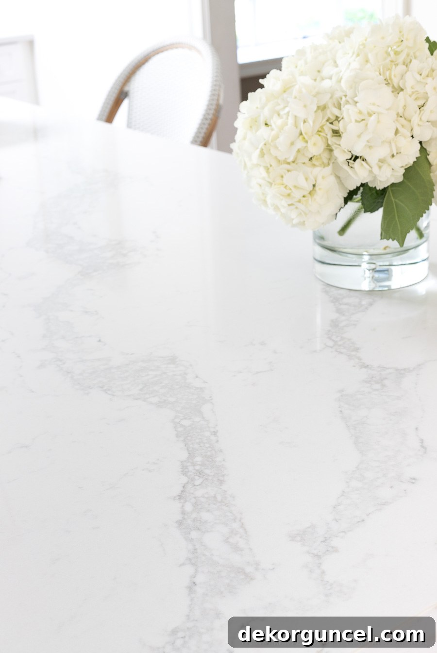 Our Kitchen Remodel: From Drab to Dreamy 11 Discover Caesarstone's Statuario Maximus, the ultimate marble look-alike quartz for a stunning, low-maintenance kitchen remodel. Featured here in our newly redesigned kitchen, offering both beauty and durability.