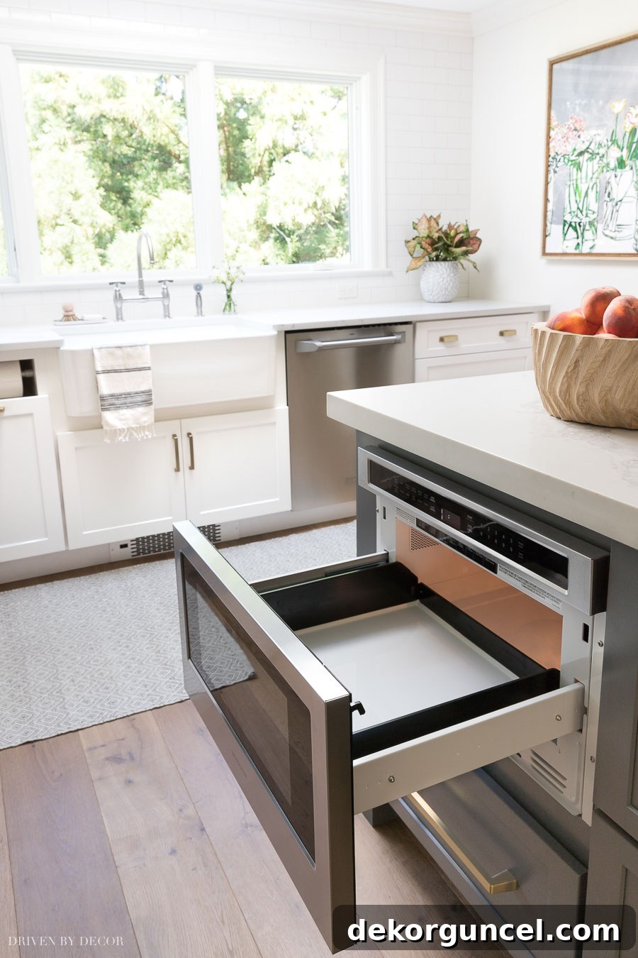Our Kitchen Remodel: From Drab to Dreamy 16 Initial skepticism turned to absolute delight with our new microwave drawer, seamlessly integrated into the kitchen island. Learn more about this popular kitchen remodel feature.