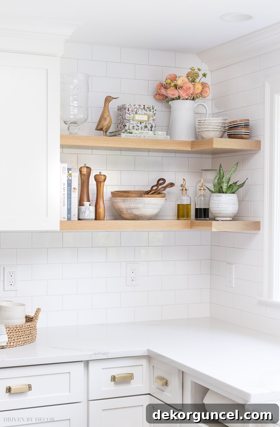 Our Kitchen Remodel: From Drab to Dreamy 23 Inspiration for open kitchen shelving decor: explore these beautiful accessories and admire the seamless wrap-around design of the shelves, perfect for modern kitchen styling.