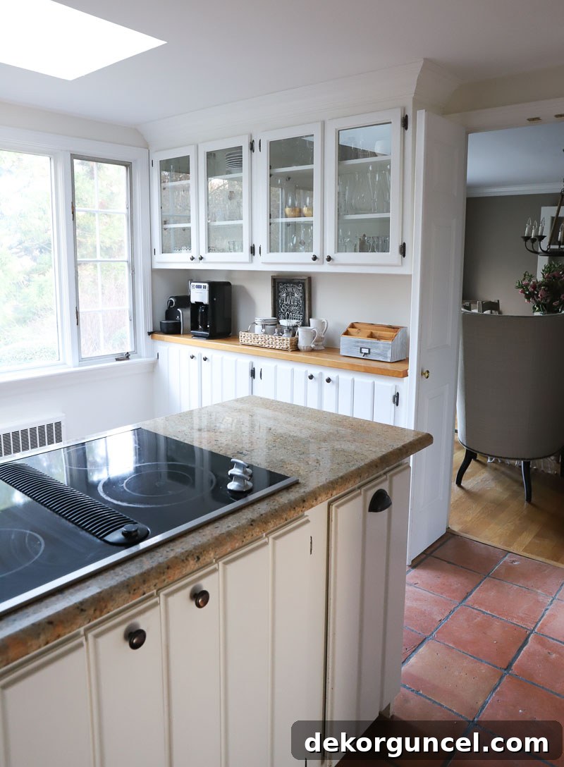 Our Kitchen Remodel: From Drab to Dreamy 27 A view of the old, shallow cabinetry in the corner of our kitchen, highlighting its limitations before the comprehensive renovation.