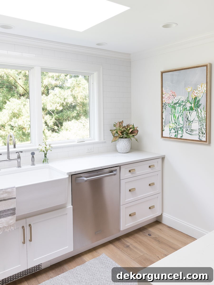 Our Kitchen Remodel: From Drab to Dreamy 28 Discover the perfect artwork for a gray and white kitchen, enhancing the beauty of this fabulous kitchen renovation. Click for sources and more stunning pictures.