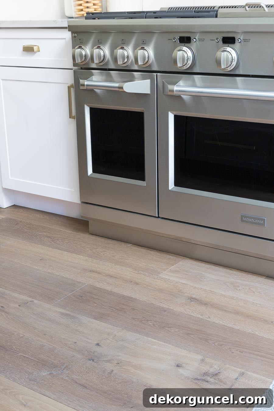 Our Kitchen Remodel: From Drab to Dreamy 32 Showcasing gorgeous engineered wood flooring, Hallmark's Alta Vista in Malibu, used throughout this modern kitchen remodel, adding warmth and elegance.