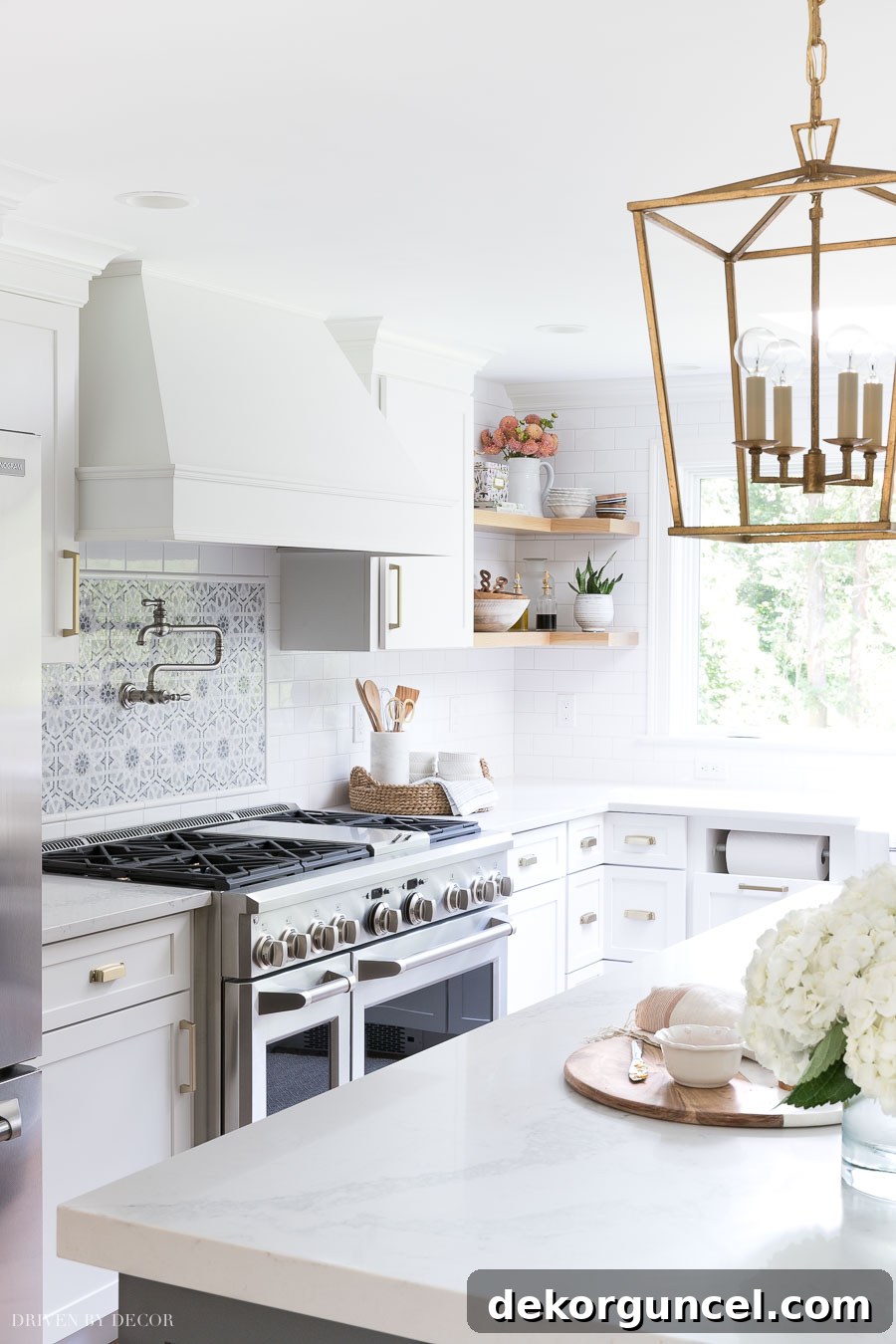 Our Kitchen Remodel: From Drab to Dreamy 6 Explore our newly remodeled kitchen featuring elegant white Shaker style overlay cabinets from Diamond's Montgomery line, boasting the perfect neutral white shade for modern kitchen design.