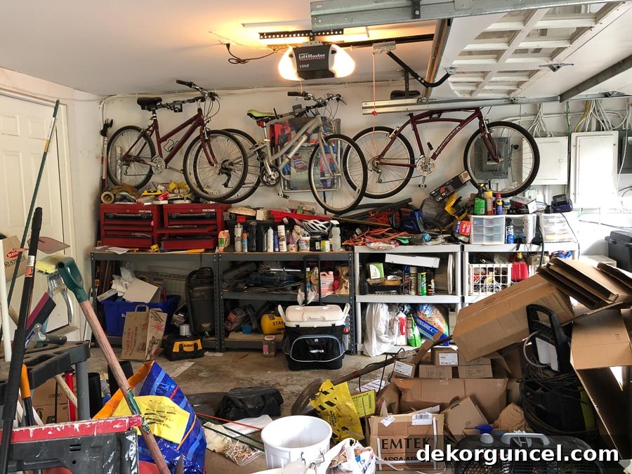 Our severely cluttered and disorganized garage before its transformation into an organized storage space with The Container Store's Elfa system.