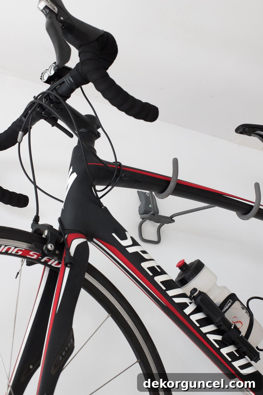 A clever way to hang your bike on the garage wall: an Elfa wall-mounted bike rack.