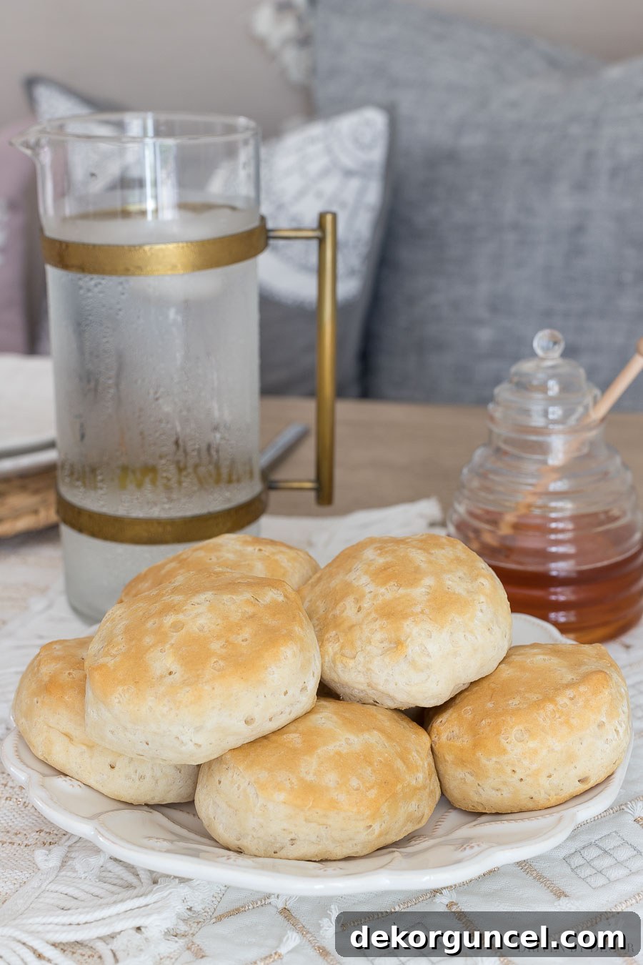 The adorable honey jar paired with the elegant brass-banded glass pitcher. Both beautiful and functional items are linked in the post for easy sourcing.