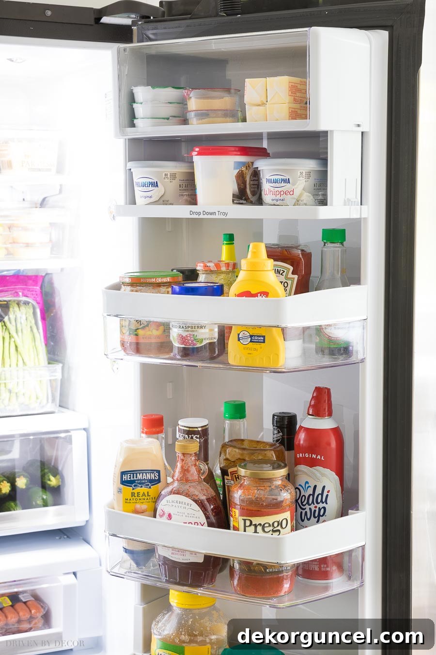 Top 10 Kitchen Appliance Features You'll Love 6 Convenient drop-down tray on the refrigerator door allows easy space adjustment for taller items.