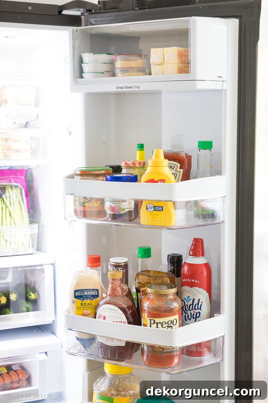 Top 10 Kitchen Appliance Features You'll Love 7 Versatile drop-down tray adjusts to provide extra storage height or tucks away when not needed.