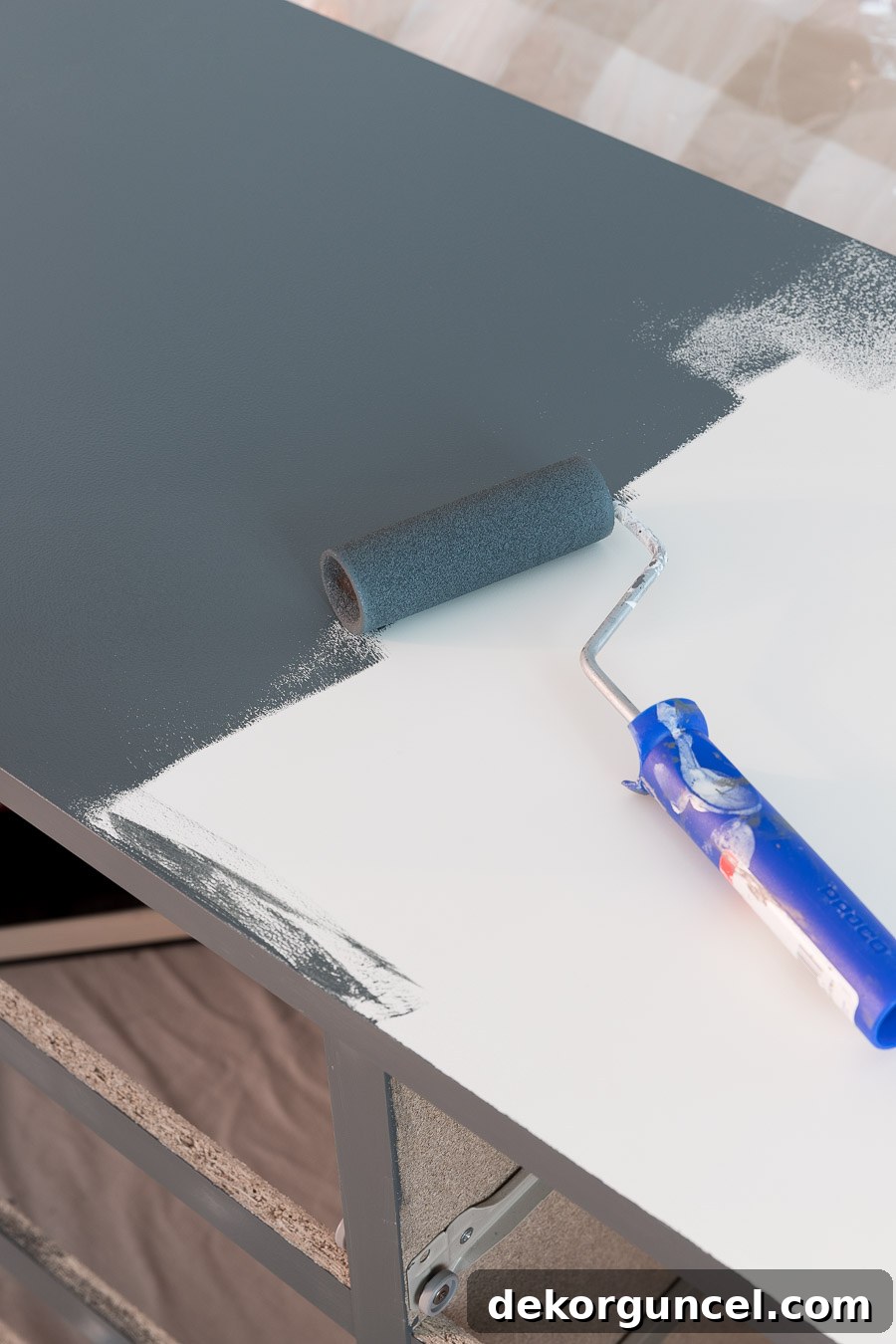 Detailed process of painting an IKEA Malm dresser with Behr's Blue Metal, showcasing primer application and smooth rolling techniques for a durable finish.