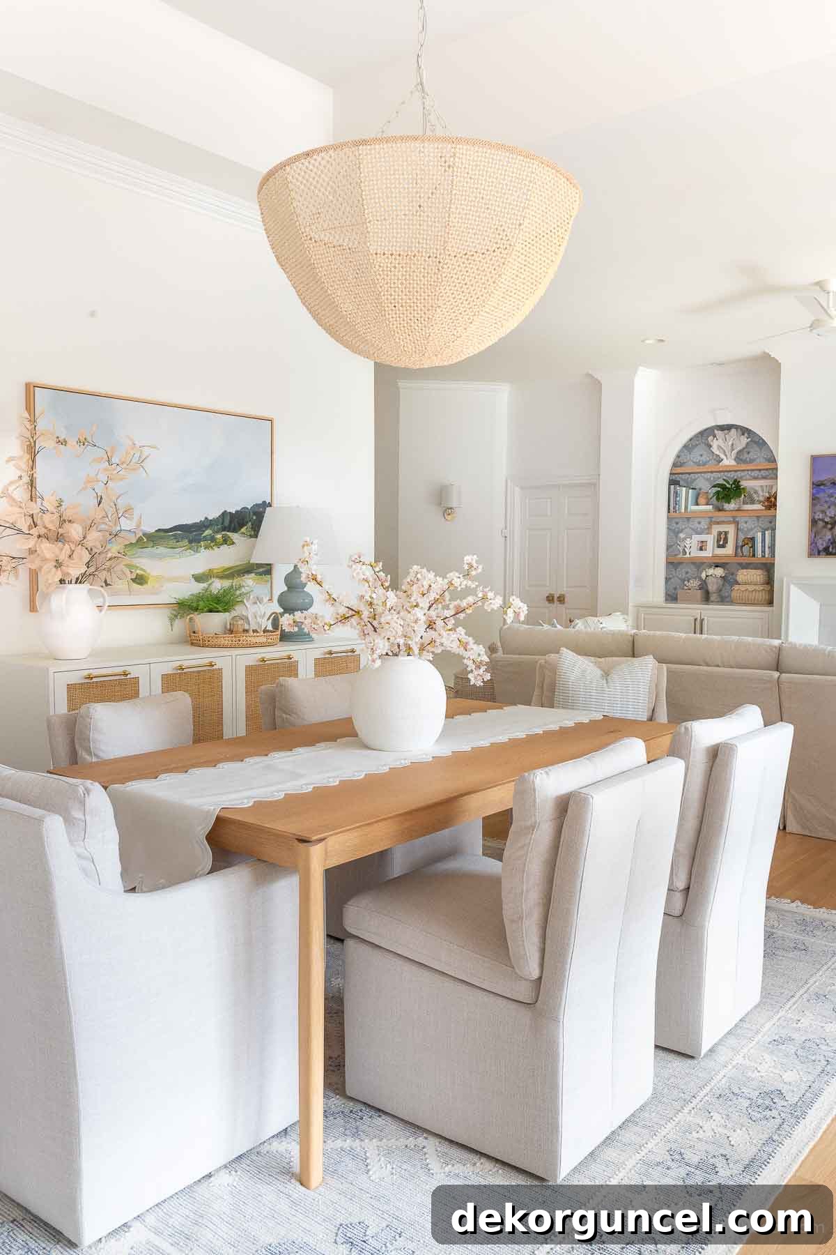 Behind the Illumination: My Home's Fixture Selections 7 A stunning beaded chandelier suspended above a dining room table, serving as an elegant focal point.