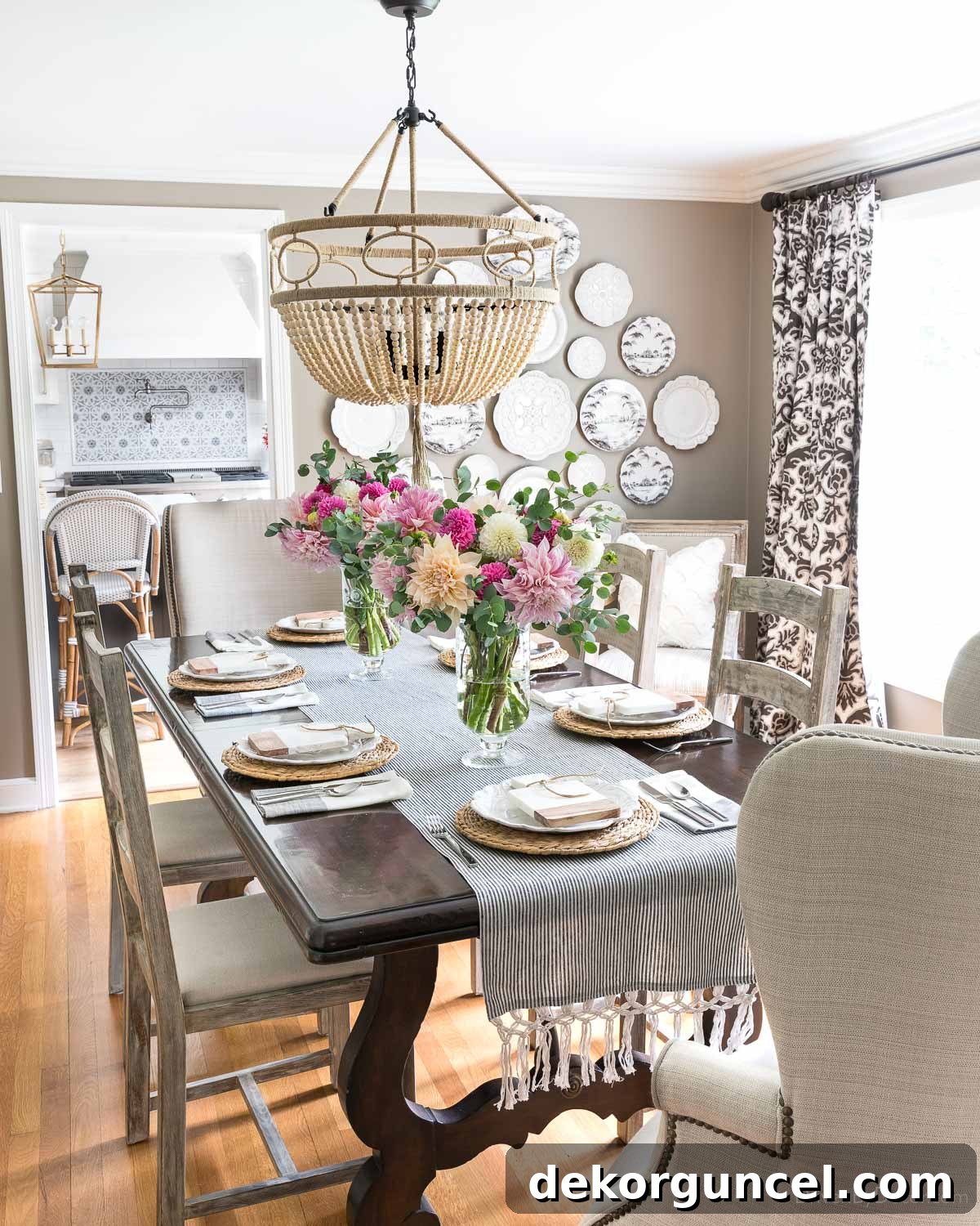 Behind the Illumination: My Home's Fixture Selections 10 A charming wood bead chandelier suspended over a dining room table, offering a blend of rustic and elegant design.