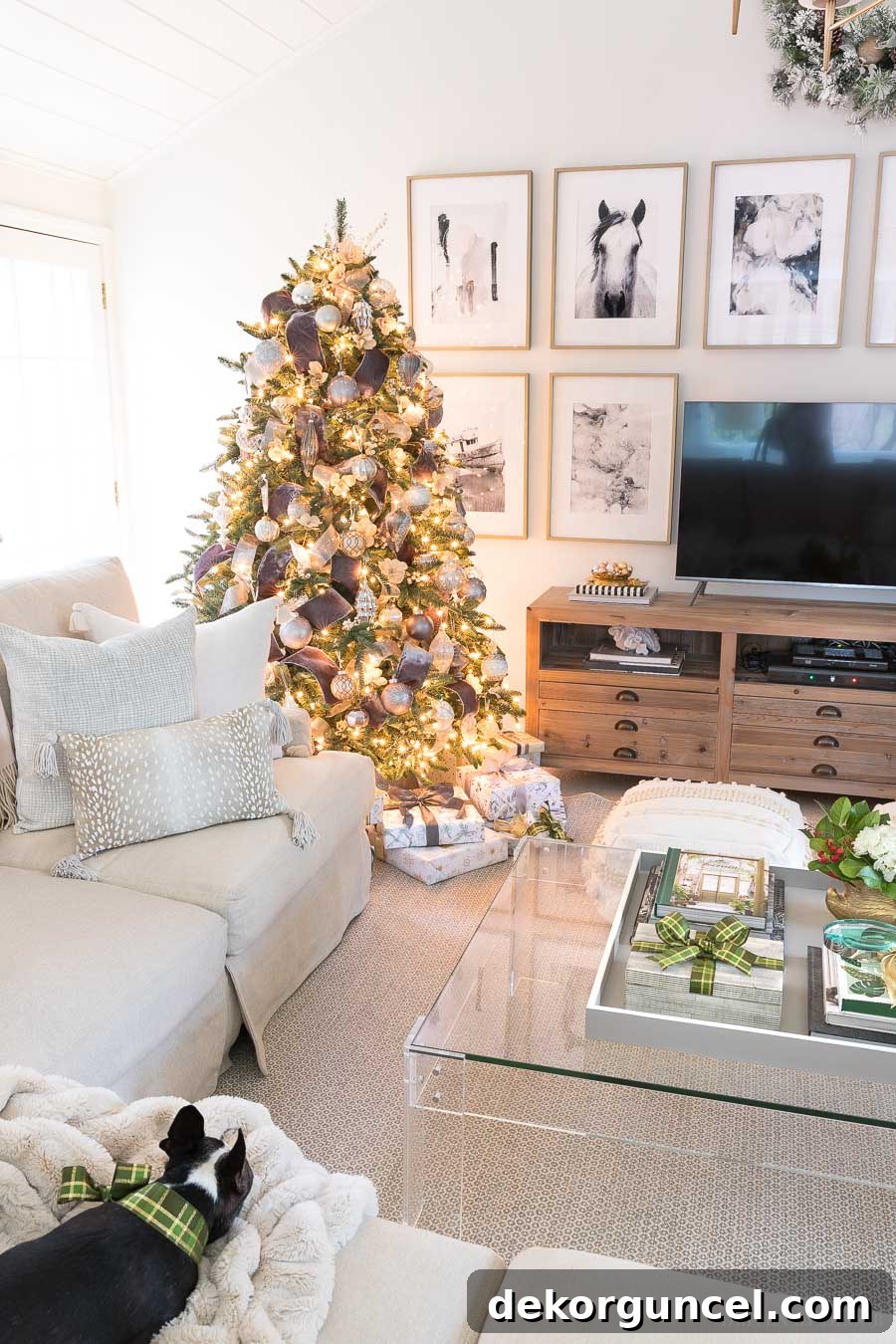 A charming New England home beautifully decorated for Christmas, featuring a stunning Christmas tree and cozy ambiance
