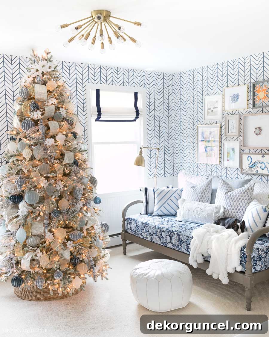 Beautiful blue and white Christmas tree with elegant gold accents, creating a sophisticated holiday display