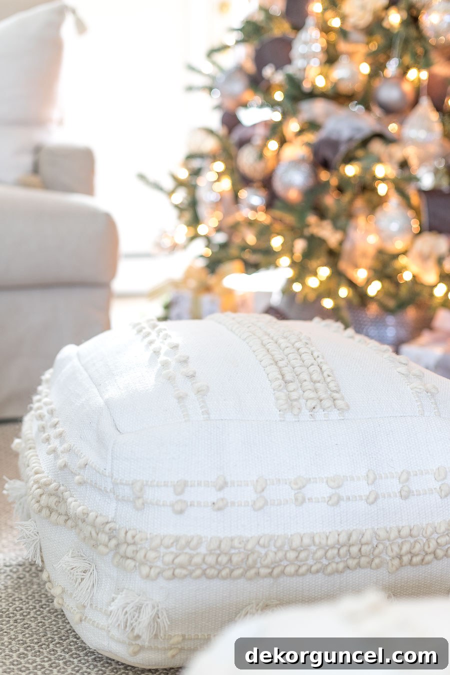 Affordable and beautiful white floor poufs adding comfort and style to a contemporary interior