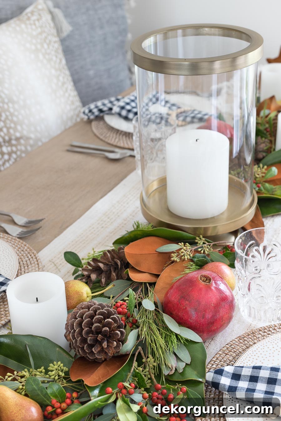 Elegant Brass Hurricane: The Perfect Complement to a Fresh Greenery Table Runner, Adding a Touch of Sophistication and Warm Ambiance. Details in Post.