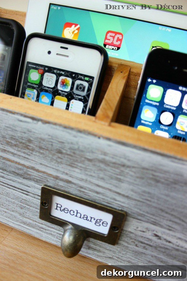 Effortless Homemade Charging Center 5 Driven by Decor - Recharge label on electronics charging station